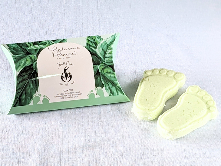 Mintasmic Moment Fizzy Feet come in a two pack, in a gorgeous pillow box featuring mint leaves. Minstasmic Moment Fizzy Feet will help soften your skin, relax muscle and mental tension, and feature Peppermint, Spearmint, Tea Tree and Bergamot pure essential oils.