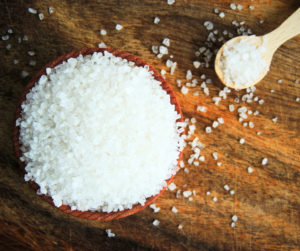 A bowl of Epsom salts with wooden spoon.  In this blog post, we'll explore the science behind this notion and debunk the myth that Epsom salts can kill bacteria.