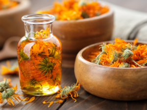 Bowls and jars full of orange flowers and oil.  Add an extra dimension to your world by exploring sensual Essential Oils!